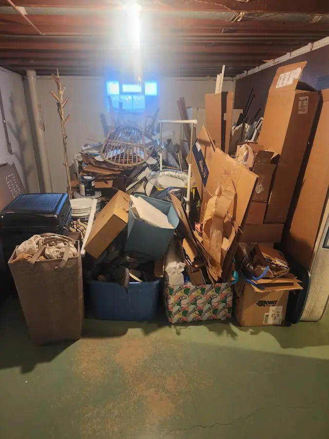 Roll-off dumpster container at job site for 4 Yard Dumpster Rental in Northwood